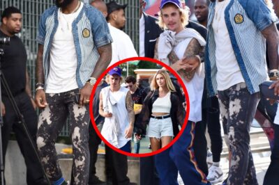NBA icons meet music royalty: LeBron James, Justin Bieber, and Hailey Baldwin shine at John Elliott’s NYFW presentation.