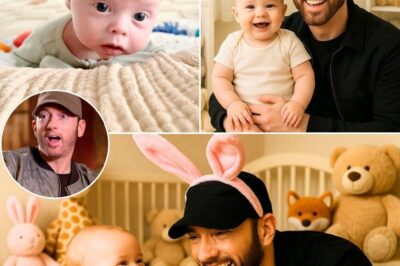 Eminem, the fiercely private rap icon known for his raw lyrics and tough exterior, just revealed a side the world rarely gets to see — and it has fans across the globe speechless. In a quietly released video, the 51-year-old artist is seen spending a full, uninterrupted day with his young grandson, Elliot. But what starts as a simple family moment quickly unfolds into something far deeper — a tender journey of love, legacy, and a mysterious whisper that’s left fans desperate for answers.