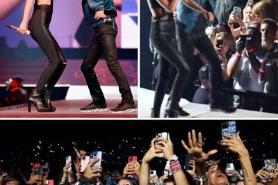 Taylor Swift Was Owning The Night… Until A Shadow Stepped On Stage — And The Crowd ERUPTED. No one saw it coming. But the moment that legendary line echoed through the arena — “I can’t get no…” — the energy shifted. The lights flashed, the audience screamed, and suddenly, there he was: rock royalty Mick Jagger, striding out beside a visibly stunned — but ready — Taylor Swift. What followed was nothing short of explosive. Taylor’s sparkling pop power collided head-on with Mick’s iconic, untamed swagger. Glitter. Guitar. Grit. Glory. All in one unforgettable performance of “Satisfaction.” Fans lost their minds. Phones flew into the air. Tears rolled down cheeks.