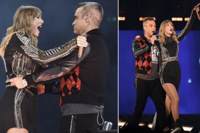 Just when fans thought Taylor Swift had pulled every trick from her glittery sleeves, out walks Robbie Williams at Wembley, and the stadium goes from pop to pure soul in three seconds — he sings “Angels,” she harmonizes like a celestial choir, and suddenly 80,000 people are crying, screaming, and filming a moment no one saw coming: a British rock god and America’s pop queen in the same spotlight, rewriting what a “surprise guest” actually means, and leaving Swifties wondering if they just witnessed the most emotionally confusing encore in tour history.