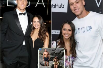 HOT PHOTOS: Aaron Judge wife, Samantha Bracksieck, had social media drooling over a photo of her in a tiny red bikini with a plunging neckline on the beach, showcasing an exceptionally alluring figure like we’ve never seen before!