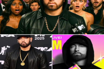 SHOCKING! Eminem Hijacks the 2025 VMAs With a Blink-and-You-Miss-It Appearance That Left Fans Asking: “What Did We Just Witness?!” — Seconds Later, Cameras Caught a Hidden Detail That Changes Everything! It lasted only seconds — but it was enough to flip the 2025 MTV VMAs upside down. Eminem, the one artist nobody expected to see, suddenly appeared in a lightning-fast moment that left the crowd gasping, stars on their feet, and social media exploding with theories. Was it a tease? A warning? The start of something even bigger? Whatever it was, it stole the entire night. But here’s the shocking part — eagle-eyed viewers swear they spotted a mysterious symbol flash across the stage the moment Eminem walked off. Now fans are convinced it wasn’t just a cameo… it was a message.
