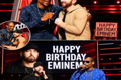“STOP THE SHOW — THAT’S EMINEM!!!” — Snoop Dogg FREEZES The Voice Mid-Taping to Send Birthday Shoutout… Then the Studio ERUPTS as Eminem Himself Unexpectedly Appears for a Shocking On-Stage Rap Collaboration That Shakes Hollywood!It started like any other episode — until Snoop Dogg suddenly stopped the cameras. The audience thought it was a joke when he said, “Hold up… today’s my brother Slim Shady’s birthday.” But seconds later, the impossible happened. The lights dropped. The crowd fell silent. And then — Eminem himself walked out on stage. No announcement. No warning. Just the living legend, standing in The Voice studio with a mic in hand. Snoop burst out laughing, shouting, “He’s really here, y’all!” as the two icons launched into an explosive, impromptu rap performance that left every coach on their feet — Reba, John Legend, and Chance included. The entire room shook with energy. Fans online are calling it “the greatest surprise in The Voice history” — a birthday moment so powerful, it brought the internet to a standstill.