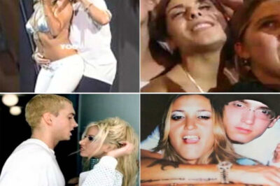 “THE 12-SECOND WHISPER THAT NEARLY BROKE EMINEM ONSTAGE — Dina Rae’s Secret 2002 ‘Superman’ Moment Resurfaces After 20 Years, Exposing the Raw, Unfiltered Chemistry Detroit Was NEVER Meant to See”!When Eminem looks back on his wildest era, there’s one night he says never faded — the 2002 Detroit performance where Dina Rae stepped out for “Superman” and turned the Joe Louis Arena into a firestorm of electricity, and fans never knew that moments before they walked onstage, she whispered something in his ear that froze him in place and changed the entire energy of the performance, a secret he still won’t reveal but admits left him genuinely moved, a connection so raw that now, as the clip resurfaces two decades later, millions are rewatching it and saying the same thing — you can see everything in their eyes.