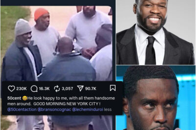 BREAKING NEWS: 50 Cent is back online — and this time, he’s taking aim at Diddy once again. The rap mogul just reacted to a new photo of Diddy smiling in prison surrounded by a group of inmates, saying bluntly: “I don’t like this picture. Man’s smiling too hard in there… what’s going on?”