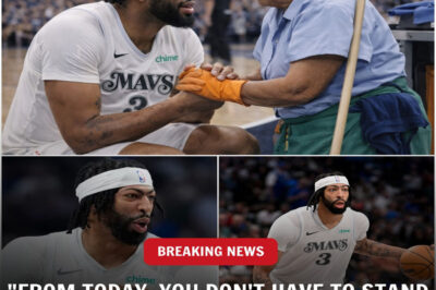 A MOMENT OF SILENCE AS ANTHONY DAVIS STOPPED NEAR THE SIDELINE AND KNELT BEFORE AN ELDERLY STAFF MEMBER.