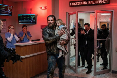 The ER froze when a fearsome biker burst through the doors, begging for help while carrying a dying child. But when her DNA was tested, the system collapsed—and the FBI sealed the hospital after discovering the girl officially did not exist.