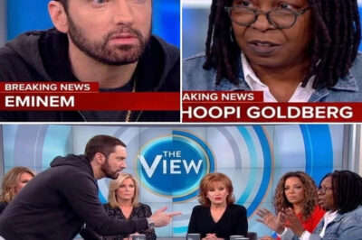 “The Day Eminem Took Over ‘The View’ — When the Rap Legend Broke Every Rule of Live TV, Silenced the Studio with One Final Mic Drop, and Left the Nation Stunned in a Moment No One Saw Coming”! Eminem walked onto The View like any other guest—calm, composed, ready to talk. But minutes later, the entire studio spiraled out of control. No script predicted what came next. No control room could stop it. When Whoopi Goldberg slammed her hand down and yelled, “SOMEBODY CUT HIS MIC — NOW!” the line had already been crossed. The cameras locked onto Eminem—not just a guest, but the epicenter of a live storm. His voice was sharp and measured, cutting through the chaos: “You don’t get to sit in a position of power… and dismiss anyone who doesn’t fit your version of the truth.” The room froze. Back and forth, tension crackled as Eminem refused to shrink himself to fit their comfort zone. When the studio tried to silence him, he calmly removed his mic, declaring: “You can turn off my mic, but you can’t silence the truth.” Then he walked off, leaving behind a show—and a nation—stunned. This wasn’t just a TV moment. It was a reckoning.