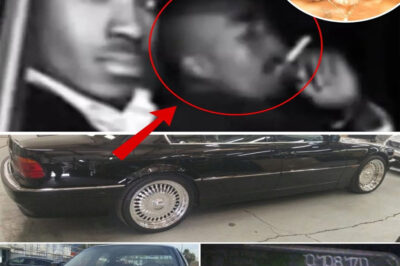 TUPAC WAS ONLY 25… AND HIS LAST 15 MINUTES STILL FEEL LIKE A MOVIE SCENE A Tyson fight, a red light, a white Cadillac… but it’s one image from inside the car that people can’t stop thinking about
